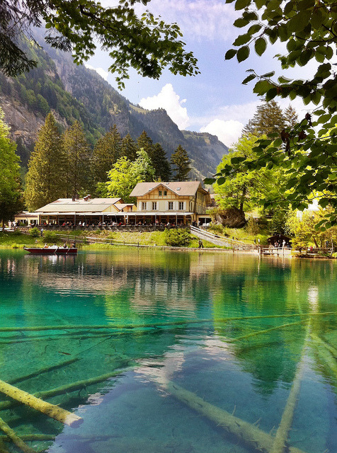 The idyllic Blausee in Kander Valley, Bernese Oberland, Switzerland